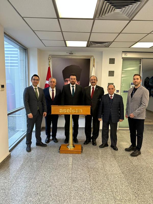 Chapter officers pose for a photo with Mustafa Yaman, deputy general manager of ASELSAN AS, in December.