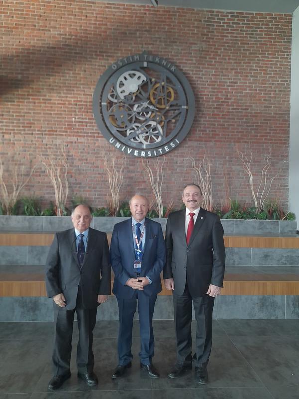 (l-r) Capt. Zafer Betoner, TUN (Ret.), chapter vice president; Serdar Muldur, vice rector, OSTIM Technical University (OTU), and Capt. Kamil Zafer Selcuk, TUN (Ret.), chapter president, pose for a photo at OTU in January.