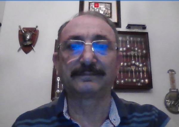 In April, Capt. Kamil Zafer Selcuk, TUN (Ret.), chapter president, introduces Gen. Alagoz. 