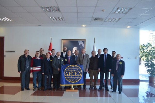 Posing after the election of new chapter officers in January are (l-r): Serdar Erkoca, assistant member of the board of auditors;  Zafer Dokuzoglu, member of the board of auditors; Capt. K. Zafer Selýuk, TUN (Ret.), chapter secretary; Capt. A. Zafer Betoner, TUN (Ret.), vice president activities; Lt. Murat Dogen, TUAF, award member; Lt. Col.Yucel Kuru, TUA (Ret.), assistant member of board of directors; M. Emin Halitligil, associate member of Luciad; Col. Erdogan Ezbiderli, TUA (Ret.), member of the board of auditors; Erdinc Oguz, treasurer; Col. İ.Bora Býyýkýner, TUA (Ret.), chapter president; Cahit Erikci, assistant member of the board of directors; Ugur Karavelioglu, associate member of Aselsan; Y. Suat Bengur, chairman of the board of auditors; Cagatayhan Colakoglu, associate member of Aselsan; and Yalcin Onyuru, associate member of Target Group.