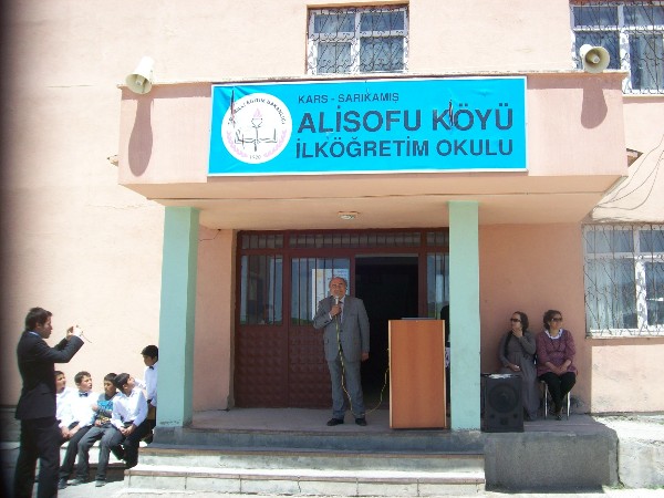 The principal of Alisofu Koyu Ilkogretim Okulu elementary school thanks the chapter for its $1,000 STEM Award, which will go toward basic tools for the science classrooms.