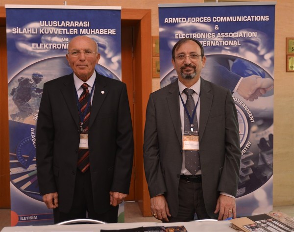 Col. I. Bora Buyukoner, TUA (Ret.), chapter president (l), and Capt. K. Zafer Selcuk, TUN (Ret.), chapter secretary, are at the chapter booth at the November seminar.