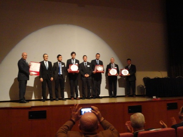 Guest speakers at the opening session of the TAI Aviation and Avionics Systems Seminar and Exposition in November include (l-r): Huseyin Baysak, general secretary of SaSaD; Ismail Demir, undersecretary for Defense Industries of MND; university students, Onuralp Cakan, Emre Erbuga and Eren Durkaya, who are members of ITU model satellite team; Nezir Erturk, general manager, Otonom Technology; Vance Hilderman, director of global services, Vector Software; and Kivilcim Ozaner, UZAYTEM, Ondokuz Mayis.