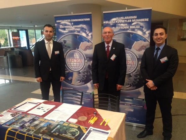 (l-r) M. Yasar Ercan, chapter member, Col. I. Bora Buyukoner, TUA (Ret.) and chapter president and Seyfettin Sunger, chapter member, pose at the chapter booth during the 4th Military Electronics Systems Seminar and Exposition in January. 