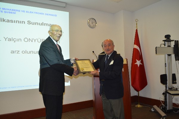 Past Chapter President Yalcin Onyuru (r) presents the Distinguished Life Member certificate to Col. I. Bora Buyukoner, TUA (Ret.), during a March ceremony.