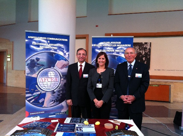 In November, representing AFCEA at the chapter's exhibit are (l-r) Capt. K. Zafer Selcuk, TUN (Ret.), chapter secretary; Seniz Ulucay, a stand assistant; and Col. Buyukoner.