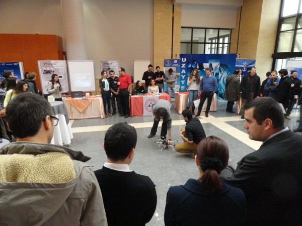 University students who are the members of ITU model satellite team demonstrate their model helicopter at the exhibition hall during the TAI Aviation and Avionics Systems Seminar and Exposition in November.