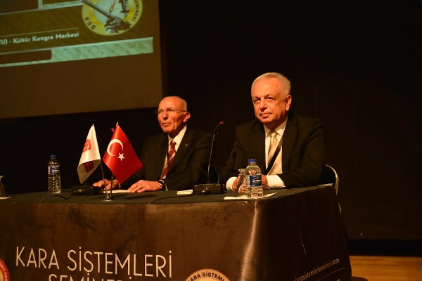 Col. I. Bora Buyukoner, TUA (Ret.) (l), chapter president and Mr. Haluk Bulucu, vice president, TOBB Defense Industry Council speak during the opening session of the chapter's seminar on land systems in November. 