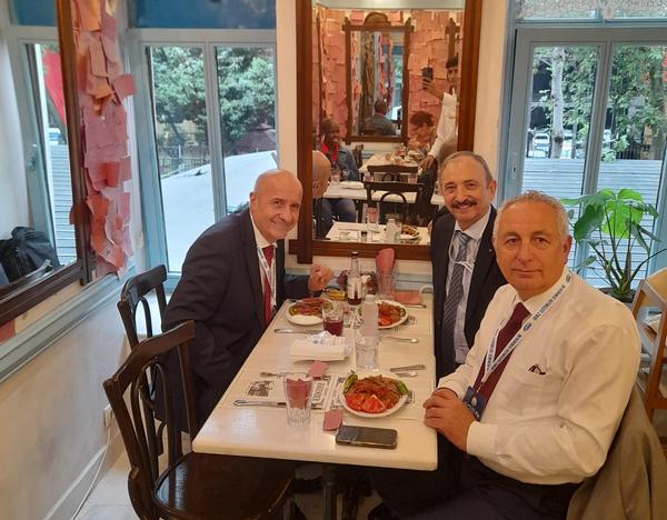 In May, Esposito, Chapter Treasurer Erdinc Oguz (front r), and Selcuk enjoy a meal at the cozy and Iskender Kebab restaurant.