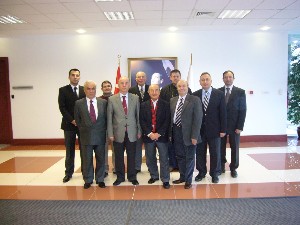 Board of auditors and steering committee members gather at the chapter's February meeting.