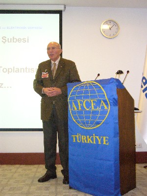 Col. I. Bora Buyukoner, TUA (Ret.), newly elected chapter president, presents the Chapter Annual Report for 2010 at the January meeting.