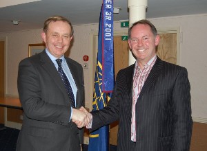 Russell Searle (l), chapter president, thanks guest speaker Air Cdr. Peter Beange, RAF, head of programs, Defence Information Systems and Services, for his January presentation.
 