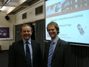 Russell Searle (l), chapter president, thanks Dr. Howard Tripp, a space consultant for Roke Manor Research Limited, following his presentation at the February meeting.