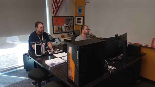 Bradley Whitaker (l) and Paul Getz collaborate at Western Maricopa Education Center in October.