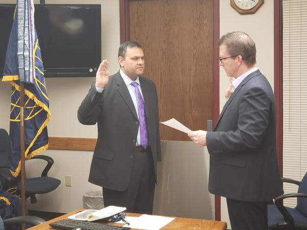 In December, Tim Martin, regional vice president, Northwest, swears in the new chapter president, Francicso "Frank" Gonzalez (l).