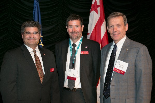 Attending the Mobility Industry Day in July are (l-r) Randy Clark, chairman of the chapter's Mobile Working Group (MWG); Randy Siegel, vice chairman of MWG; and Randy Conway, director of C4 and information infrastructure for the Defense Department's chief information officer.