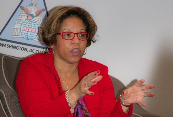 Janice Haith, the U.S. Navy's deputy chief information Officer, speaks at the chapter's breakfast event in October.