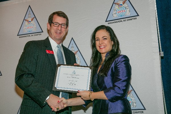 Chapter President Tim Solms recognizes AFCEAN of the Month Katie Webb in November.