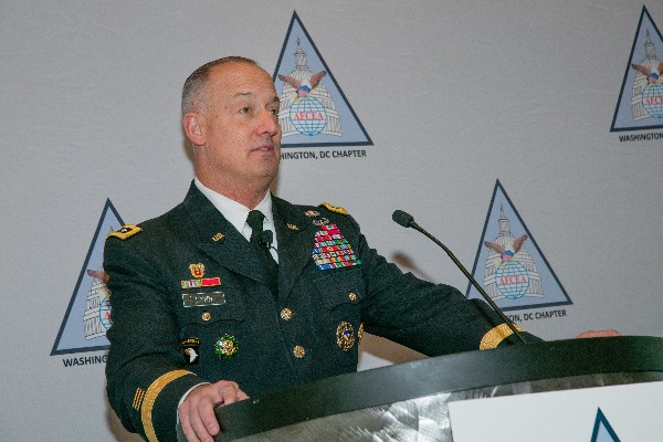 Lt. Gen. Alan Lynn, director, Defense Information Systems Agency (DISA), speaks to attendees at the chapter's November event.