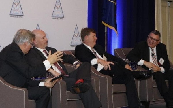 (l-r) DISA's Tony Montemarano, executive deputy director, David Mihelcic, CTO, John Hickey, CIO and Alfred Rivera, director, development and business center, discuss the agency's needs at the January breakfast. 