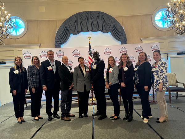 Pictured (l-r) at the November luncheon are Tereza Jacoby, chapter board member, Splunk; Becci DeFrank, chapter president, NVIDIA; Darek Kitlinski, panelist, A1 chief technology officer, U.S. Air Force; Heath Giesecke, panelist, director, Enterprise Cloud Management Agency, U.S. Army; Hollie Parrish, panelist, U.S. Coast Guard; James Cherry, keynote speaker, division chief, Hybrid Cloud Services, National Geospatial-Intelligence Agency; Alee Long, panelist, program manager, Joint Warfighting Cloud Capability, Department of Defense; Shaleen Braley, chapter vice president of programs, Oracle; Kimberly Underwood, panel moderator, SIGNAL Media; and Indira Donegan, chapter board member, Red River. 
