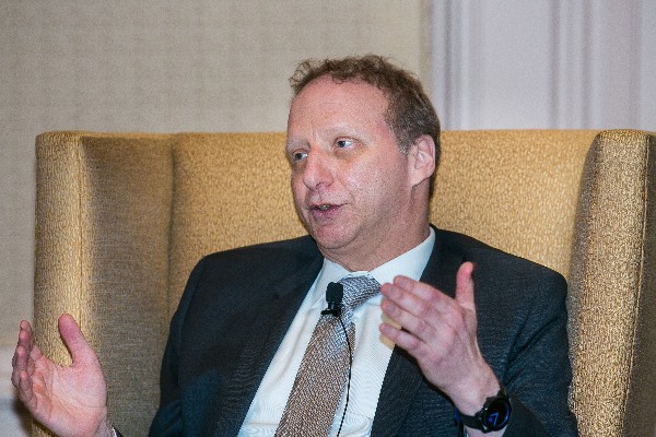 Schwartz addresses attendees at the April luncheon.