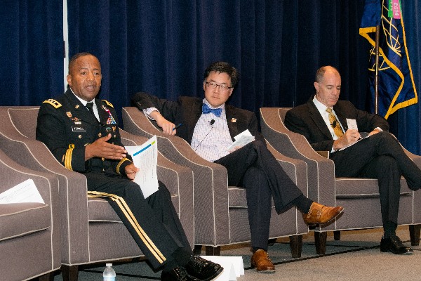 Participating in a panel discussion at the September breakfast are (from l) Gen. Ferrell; Gary Wang, deputy chief information officer/G-6, U.S. Army; and Doug Wiltsie, program executive officer, Program Executive Office Enterprise Information Systems. 