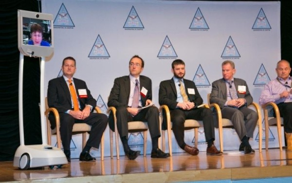 Dallas Goecker joins a panel discussion on mobility from Indiana via a robotic telepresence device developed by Suitable Technologies to facilitate remote collaboration. Goecker was a panelist at the Mobile Tech Summit held in Washington, D.C. in January.