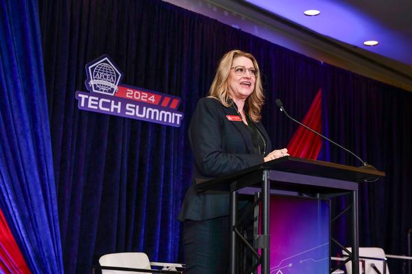 Becci DeFrank, chapter president, delivers opening remarks, at the October event.