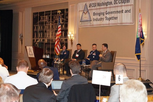 During the March luncheon, the audience listens to a panel on Air Force cybersecurity and information technology initiatives, (l-r) Gen. Zabel, Kim, Maj. Silk and Stanley.