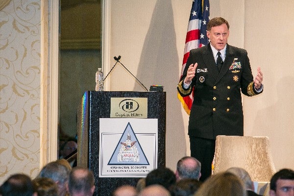 Adm. Michael Rogers, USN, director of the National Security Agency, commander of the U.S. Cyber Command and chief of the Central Security Service, takes the stage during the chapter event in April. 