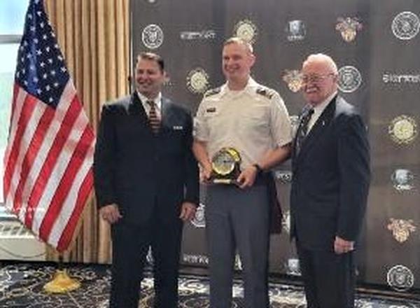 In May, Aaron Hampton, chapter president (l), presents the AFCEA Brig. Gen. Boyd Wheeler Bartlett, USA, Honor Award to Cadet Taylor Schorlemmer (c) with Dan Braun, vice president of the Pocono Mountains Chapter, and West Point Class graduate of 1973.
