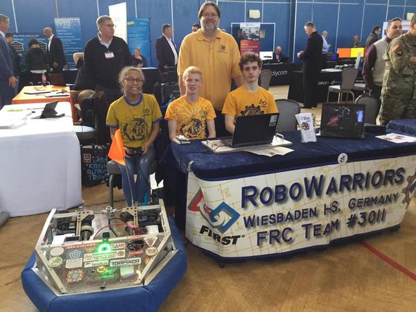 Students from the Wiesbaden High School RoboWarriors Robotics Club show off 