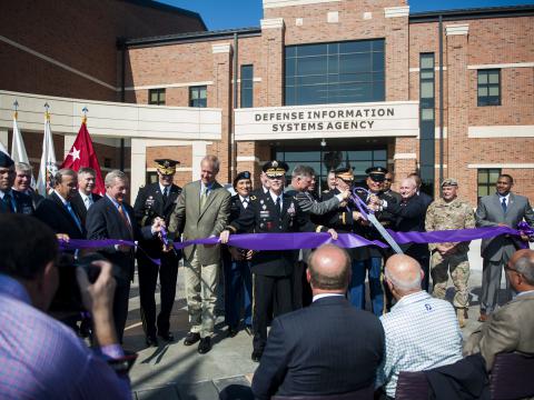 Leaders cut the ribbon, officially opening a new Defense Information Systems Agency compound at Scott Air Force Base, Illinois, in August 2016. Photo By Staff Sgt. Clayton Lenhardt, 375th Air Mobility Wing Public Affairs.