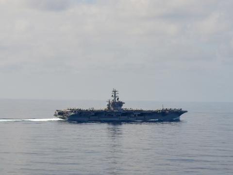 The aircraft carrier USS Nimitz streaming through the South China Sea. Photo: Seaman Carson Croom, U.S. Navy.