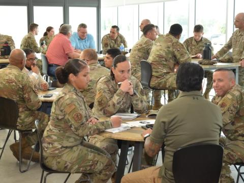 Active duty and retired Air Force leadership give advice to junior enlisted and officers during a speed-mentoring session at Joint Base San Antonio-Kelly. The entire Department of Defense has a cyber personnel shortfall of about 30,000 people. U.S. Air Force photo by Matthew McGovern