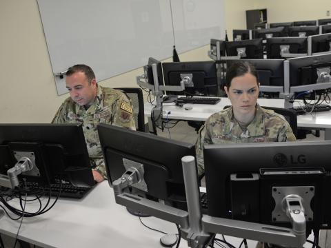 Airmen team with their Estonian counterparts to build a platform to prevent cyber threats. Photo credit: Master Sgt. Chris Schepers, U.S. Air National Guard.