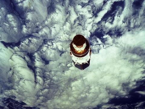 The free-flying Tracking and Data Relay Satellite-E (TDRS-E), still attached to an Inertial Upper Stage (IUS), flies in low-Earth orbit (LEO) in 2009. With the boom in commercial solutions in space, companies need to understand the threats from adversaries. Credit: NASA