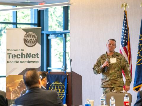 Col. Joel Feltz, commander, 22nd Corps Signal Brigade, addresses the audience at TechNet Pacific Northwest 2025 at Joint Base Lewis-McChord in Washington state. Credit: Justin Manuel