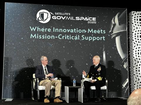 Vice Adm. Frank Whitworth, USN, director of the National Geospatial-Intelligence Agency (r), speaks with moderator John Robinson of Defense Daily at the GovMilSpace 2025 event, part of the Satellite 2025 conference.