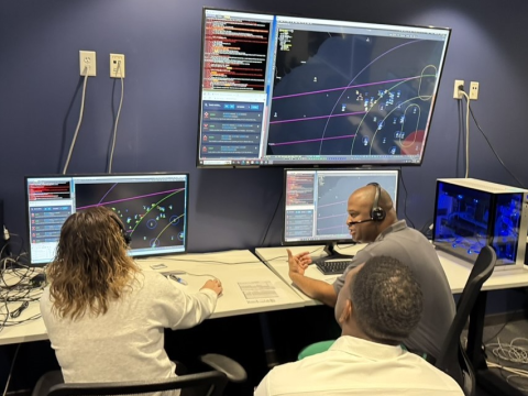 U.S. Air Force air battle managers participate in the Department of the Air Force’s Advanced Battle Management System Cross-Functional Team first Decision Advantage Sprint for Human-Machine Teaming, or DASH, experiment, held at the Howard Hughes Operations Center in Las Vegas, on April 8, 2025. (The image has been cropped to focus on the subjects.) Credit: U.S. Air Force photo