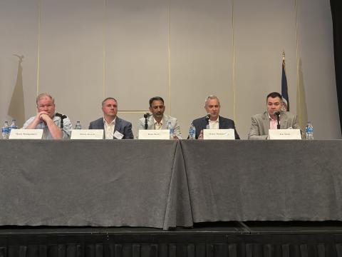 Mark Montgomery (far l) moderates, as panelists (l-r) Travis Rosiek, Ram Shetty, Henry Sienkiewicz and Jim Smid discuss resilient cybersecurity architectures on the second day of TechNet Emergence 2025 in Reston, Virginia.