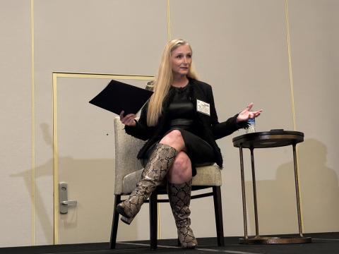 Meggan Schoenberg, principal director for Integrated Network System of Systems in the Office of the Assistant Secretary of Defense for Critical Technologies, Office of the Under Secretary of Defense for Research and Engineering, speaks at TechNet Emergence 2025 in Reston, Virginia.