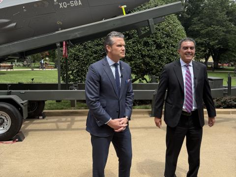 The Department of Defense will accelerate the acquisition, testing and training of unmanned aerial systems, to build defense production and outpace adversaries, says Pete Hegseth, secretary of defense (l), standing with Emil Michael, undersecretary of defense for research and engineering (USD(R&E)), on July 16 at the Pentagon.
