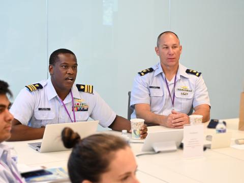 U.S. Coast Guard leadership speaks with the Coast Guard interns at NobleReach Foundation headquarters. Credit: NobleReach Foundation