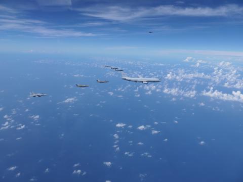 A Royal Australian Air Force (RAAF) KC-30, two U.S. Air Force F-35s, two RAAF F-35s and two Japan Air Self-Defense Force F-15Js fly in formation over the Pacific Ocean prior to the start of Exercise Bushido Guardian 25 near Misawa Air Base, Japan, September 26, 2025. International exercises and training, long held for the air and sea domains, are expanding to include space domain elements, key for a resilient future, an Australian leader says. Credit: U.S. Air Force 35th Fighter Wing Courtesy Photo