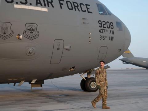 U.S. Air Force Capt. Mitch Dobson, 15th Expeditionary Airlift Squadron pilot, conducts a preflight check on a C-17 Globemaster III at Al Udeid Air Base, Qatar, June 23, 2023, in support of Air Force Central and U.S. Central Command. Credit: U.S. Air Force photo by Staff Sgt. Emily Farnsworth