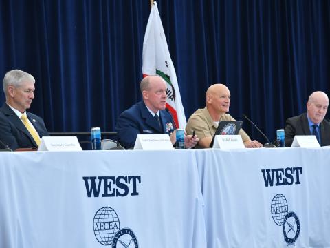 Rear Adm. Chad Jacoby, deputy commandant for Systems/Component Acquisition Executive in the Coast Guard, speaks at AFCEA West 2026 held in San Diego. Photo Credit: Jesse Karras, Karras Photography