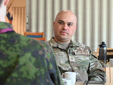 Brig. Gen. Joed Carbonell-López, commander of the 175th Wing of the Maryland Air National Guard, discusses exercise objectives and priorities with a Finnish project officer during his visit to NATO Exercise Locked Shields 26 in central Finland on April 21, 2026. Credit: U.S. Air National Guard photo by Staff Sgt. Laura Virtue