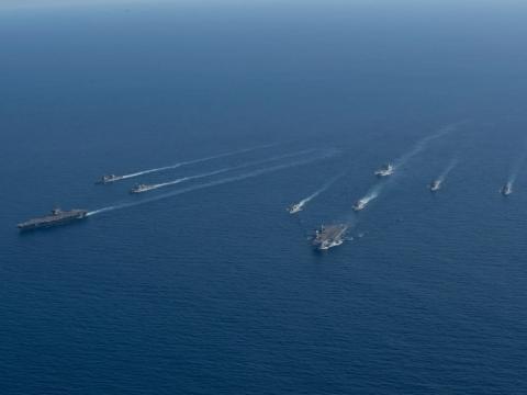 The U. K. Royal Navy HMS Prince of Wales Carrier Strike Group operates with the U.S. Navy George Washington Carrier Strike Group in the Timor Sea, as part of Talisman Sabre, July 2025. Senior U.S. military leaders call for the understanding and widespread use of Allied Communications Publications 240, standards of which underpin effective operations, data sharing and network connections, among allies. U.S. Navy photo by Mass Communication Specialist 2nd Class Tyler Crowley